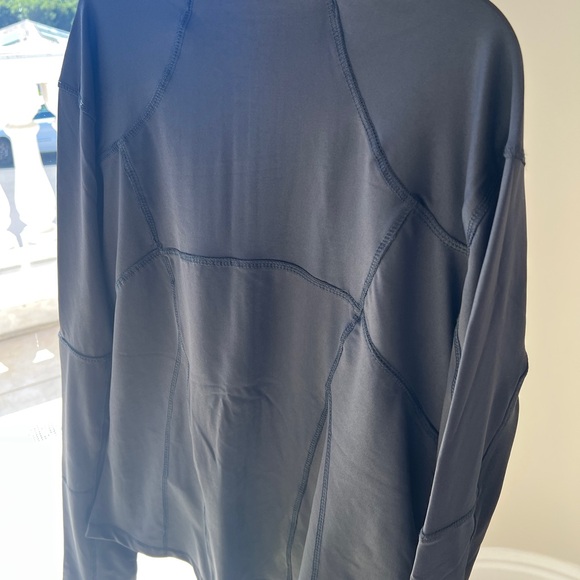 New zip up jacket. Comes in multiple sizes - Picture 2 of 3